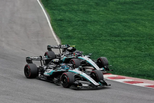 Two Mercedes F1 cars driven by Russell (leading) and Antonelli (following) at Circuit Gilles Villeneuve