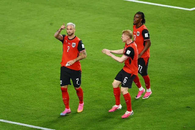 Austria opened Group J with a 3-1 win over Jordan.