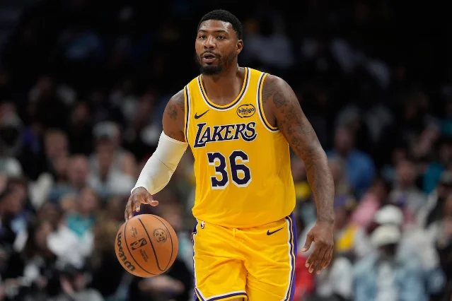 Marcus Smart in Lakers uniform dribbling upcourt vs Charlotte Hornets, November 2025