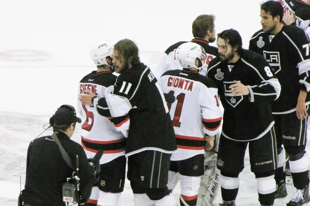 Kings and Devils players exchange handshakes on the ice at Staples Center after Game 6 of the 2012 Stanley Cup Final