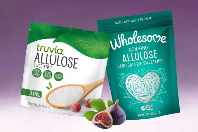 Two bags of commercial allulose sweeteners — 3-lb Truvia Allulose (left) and 12-oz Wholesome Non-GMO Allulose (right) — displayed with figs on a wooden surface