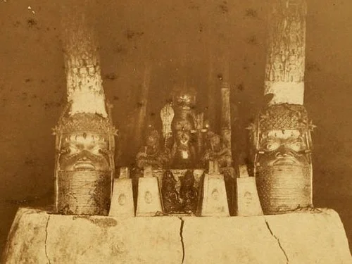 1891 photograph of the ancestral shrine in the Royal Palace of Benin City, showing bronze heads and ceremonial objects