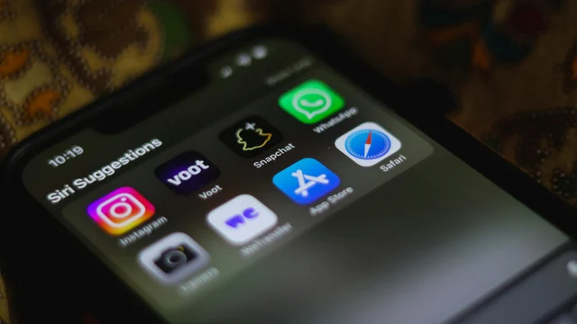 Apple iPhone home screen showing iOS app icons