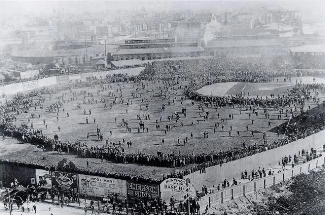 The 1903 World Series at Huntington Avenue Grounds, Boston — just four months after Piatt's doubleheader, the South End Grounds (where he pitched) is visible in the hazy background across the railroad tracks