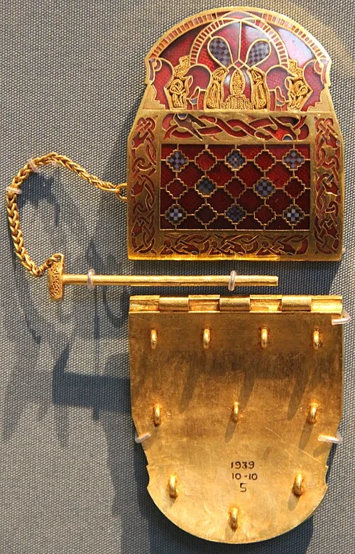 Gold and garnet shoulder-clasp from the Sutton Hoo burial, c. 625–630 CE, British Museum.