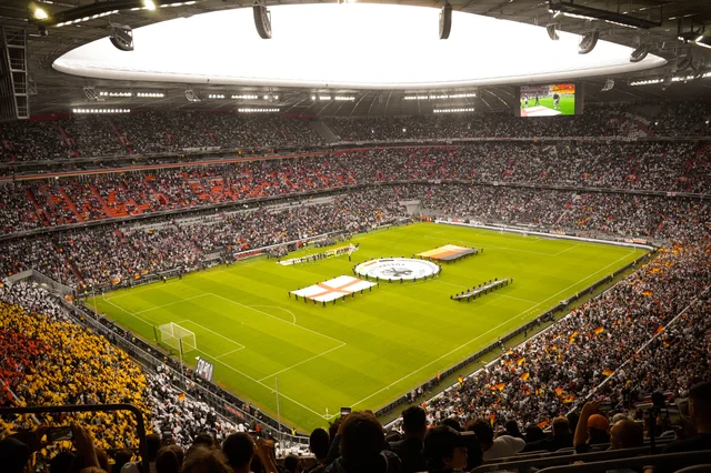 A sold-out football stadium before a major international match