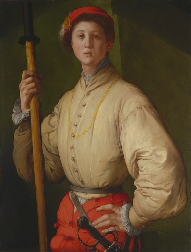 Pontormo's Portrait of a Halberdier, full composition — young man in red beret and pale tunic holding a halberd against a dark green background