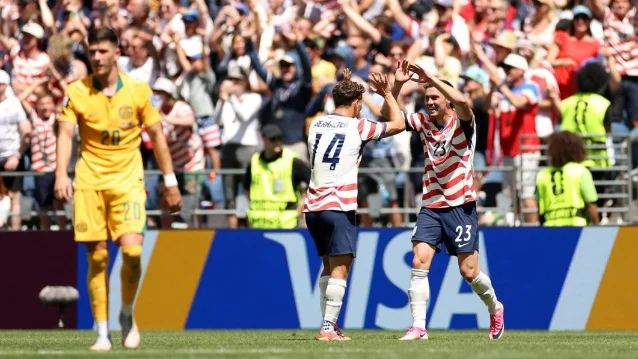 USMNT players celebrate during the Australia win