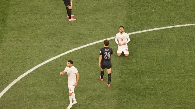 Iran and New Zealand players at full time after a 2-2 draw in Los Angeles