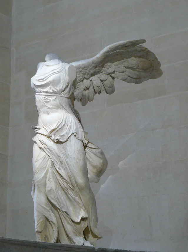 Three-quarter view of the Winged Victory, showing the drapery of the chiton and himation