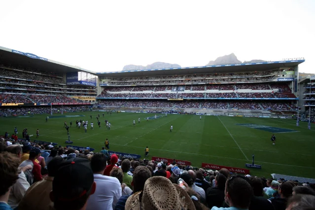 Newlands Stadium in Cape Town packed with fans, pitch visible, Table Mountain visible in the background