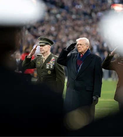 President Trump saluting alongside a four-star general at a public ceremony