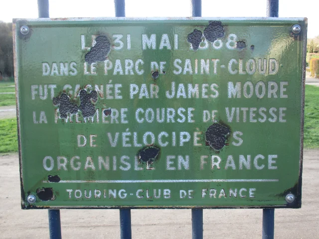 The commemorative plaque at Parc de Saint-Cloud honouring James Moore's 1868 victory