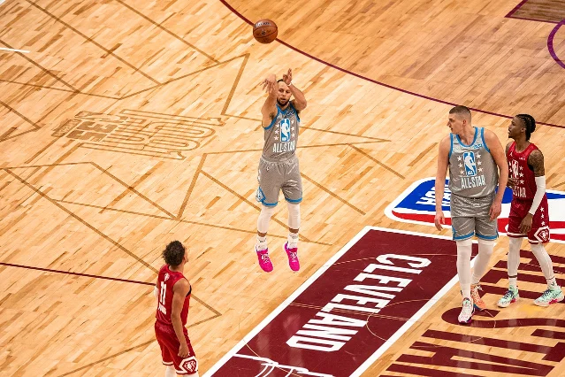 Curry mid-release at the 2022 NBA All-Star Game in Cleveland, shooting from beyond half court