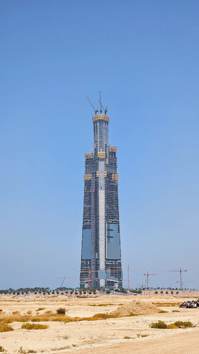 Jeddah Tower at its 100th floor, May 2026, showing the same three-wing buttressed-core geometry as the Burj Khalifa