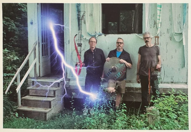 Neptune — Jason Sanford, Mark William Pearson, Daniel Paul Boucher — with handmade instruments, photographed in 2025