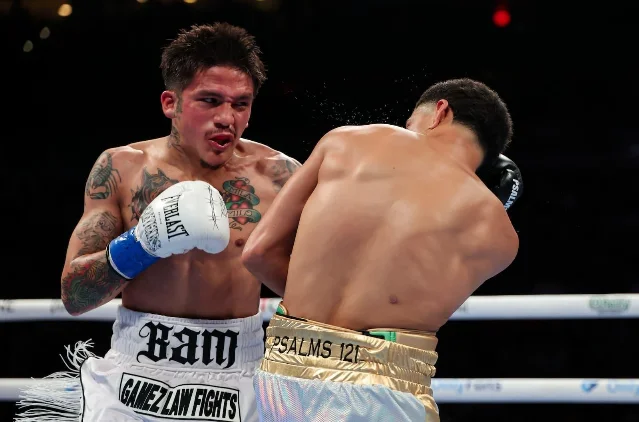 Jesse "Bam" Rodriguez landing on Antonio Vargas during their WBA bantamweight title fight in Glendale, June 13