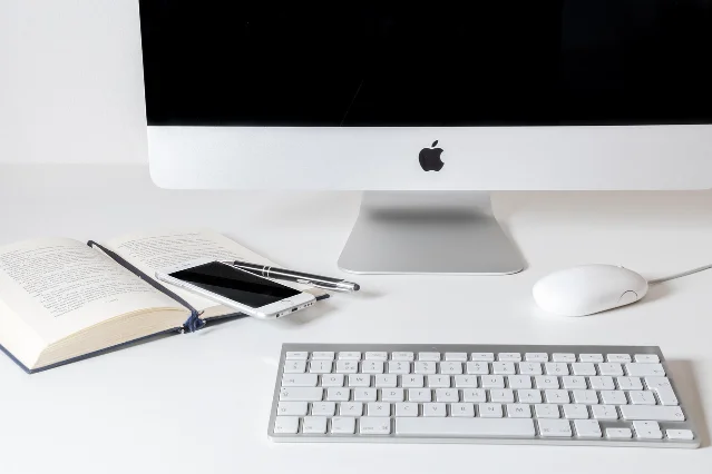Clean desk with phone and computer