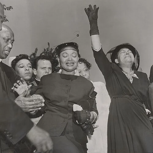 Mamie Till-Mobley weeping among mourners outside Roberts Temple, Chicago, September 1955