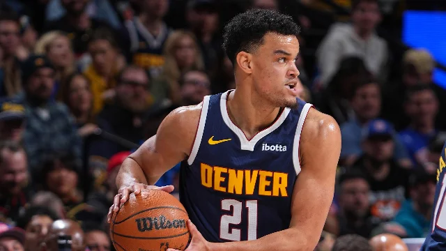 Spencer Jones handles the ball for Denver during a game