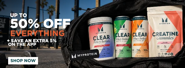 MyProtein US homepage banner showing 'Up to 50% off everything' with Clear Whey Isolate cans and Creatine Gummies in a gym bag
