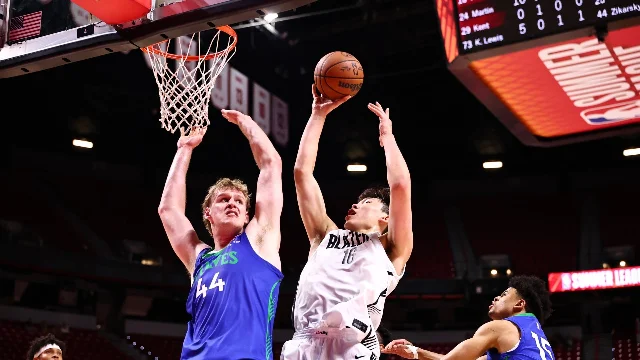 Yang Hansen contests a shot against Minnesota
