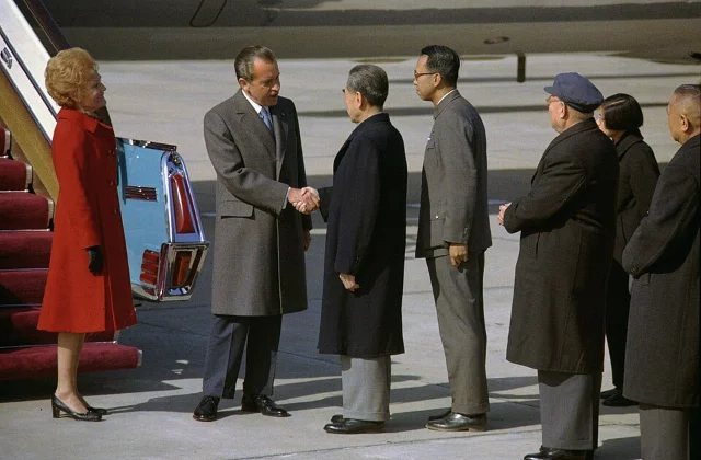 Nixon shakes hands with Premier Zhou Enlai at Beijing Airport, February 21, 1972