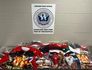 CBP Indianapolis evidence photo: stacked counterfeit FIFA World Cup 2026 jerseys seized in Operation Winner's Circle